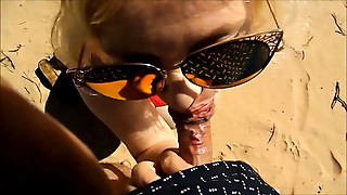 Deep throat from a mature mother on the beach